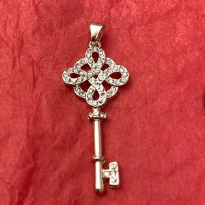 5/$25 Costume Jewelry: silver key pendant with tiny diamonds.
